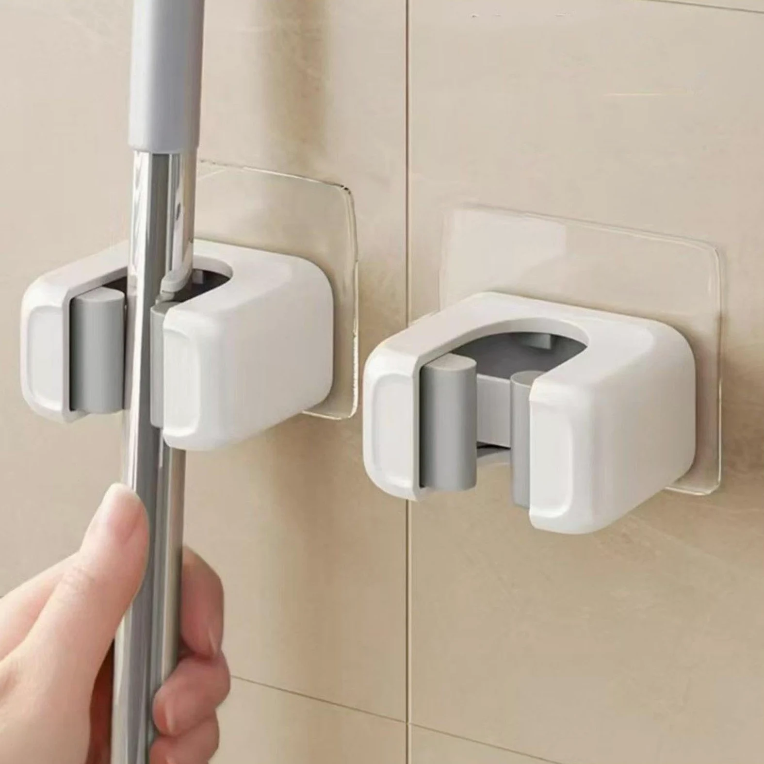 Soporte adhesivo para mopa - 2 piezas para ahorrar espacio, soporte de pared organizador para hogar, oficina, apartamento, RV, cocina, baño, garaje, laundry room, herramienta de almacenamiento