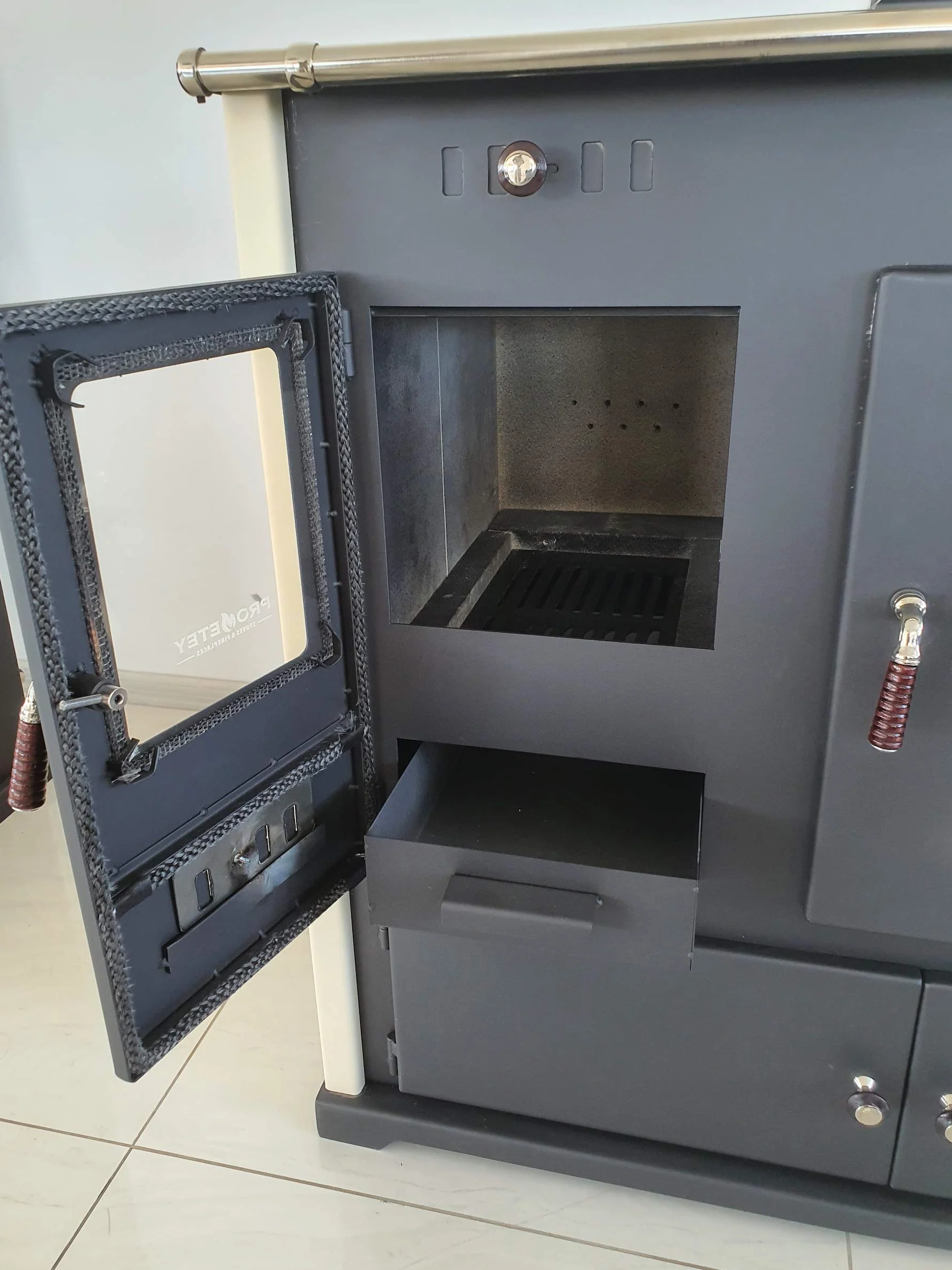 Estufa de leña Practik Lux 9,5 kW metal con compartimento y placa de cocción beige/negro