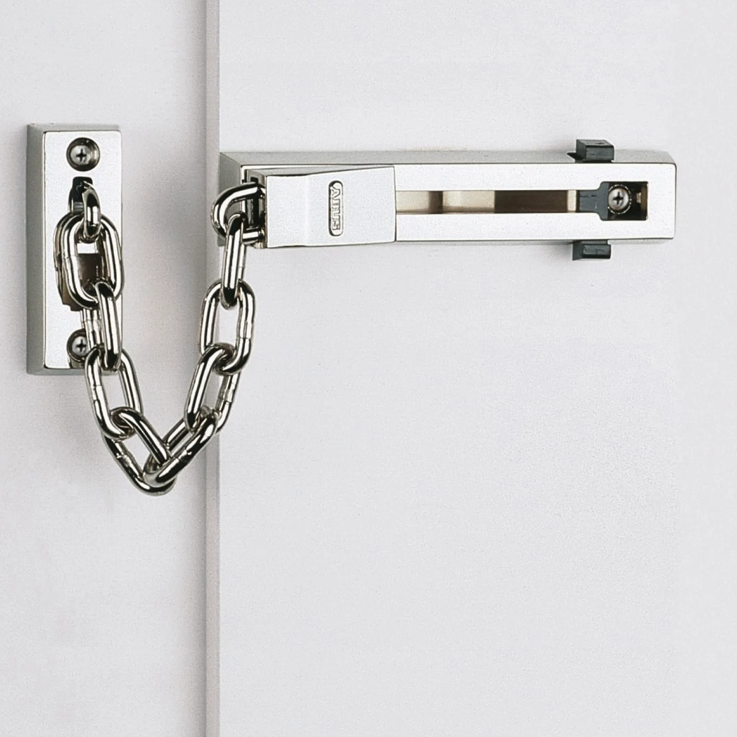 ABUS Cadena de seguridad SK66 para puerta de entrada y de vivienda - con seguro para niños - apta para puertas con apertura a izquierda y derecha - latón